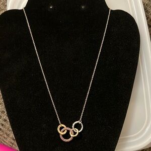 Coach necklace. Gold and silver hoops 8in fits close to the neck